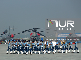 Indian Air Force's band members perform during the full dress rehearsal of Air Force Day parade at the Hindon Air Force Station on the outsk...