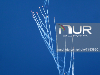 Indian Air Force's fighter aircraft Sukhoi Su-30MKI fires flares during the full dress rehearsal of Air Force Day parade at the Hindon Air F...