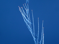 Indian Air Force's fighter aircraft Sukhoi Su-30MKI fires flares during the full dress rehearsal of Air Force Day parade at the Hindon Air F...