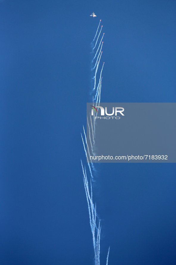 Indian Air Force's fighter aircraft Rafale fires flares during the full dress rehearsal of Air Force Day parade at the Hindon Air Force Stat...