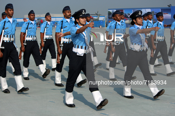 An Indian Air Force officer leads a marching contingent during the full dress rehearsal of Air Force Day parade at the Hindon Air Force Stat...