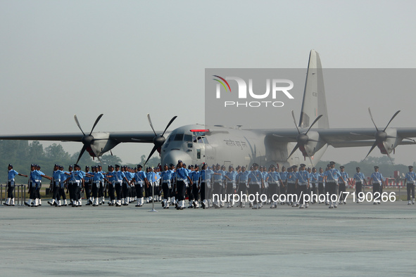 Indian Air Force (IAF) soldiers march past during the 89th Air Force Day parade at Hindon Air Force Station on the outskirts of New Delhi, I...