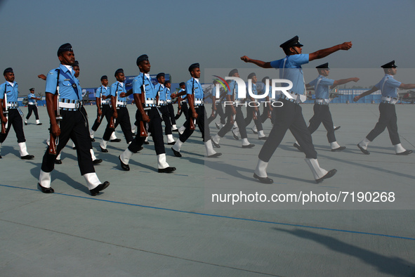 Indian Air Force (IAF) soldiers march past during the 89th Air Force Day parade at Hindon Air Force Station on the outskirts of New Delhi, I...