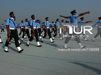 Indian Air Force (IAF) soldiers march past during the 89th Air Force Day parade at Hindon Air Force Station on the outskirts of New Delhi, I...