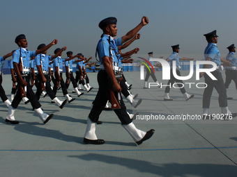 Indian Air Force (IAF) soldiers march past during the 89th Air Force Day parade at Hindon Air Force Station on the outskirts of New Delhi, I...