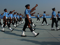 Indian Air Force (IAF) soldiers march past during the 89th Air Force Day parade at Hindon Air Force Station on the outskirts of New Delhi, I...