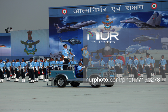 Indian Air Force's (IAF) Chief Marshal V R Chaudhari (R) inspects a guard of honor during the 89th Air Force Day parade at Hindon Air Force...