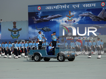 Indian Air Force's (IAF) Chief Marshal V R Chaudhari (R) inspects a guard of honor during the 89th Air Force Day parade at Hindon Air Force...