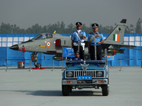 Indian Air Force's (IAF) Chief Marshal V R Chaudhari (R) inspects a guard of honor during the 89th Air Force Day parade at Hindon Air Force...