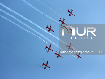 Indian Air Force's (IAF) acrobatic team 'Surya Kiran' fly in a formation during the 89th Air Force Day parade at Hindon Air Force Station on...