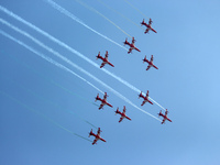 Indian Air Force's (IAF) acrobatic team 'Surya Kiran' fly in a formation during the 89th Air Force Day parade at Hindon Air Force Station on...