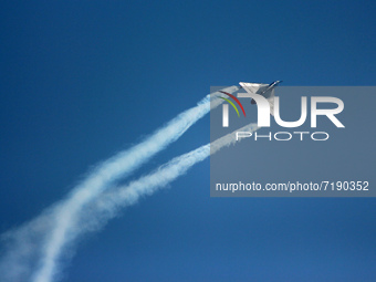 Indian Air Force's (IAF) fighter aircraft Tejas performs aerobatic maneuvers during the 89th Air Force Day parade at Hindon Air Force Statio...