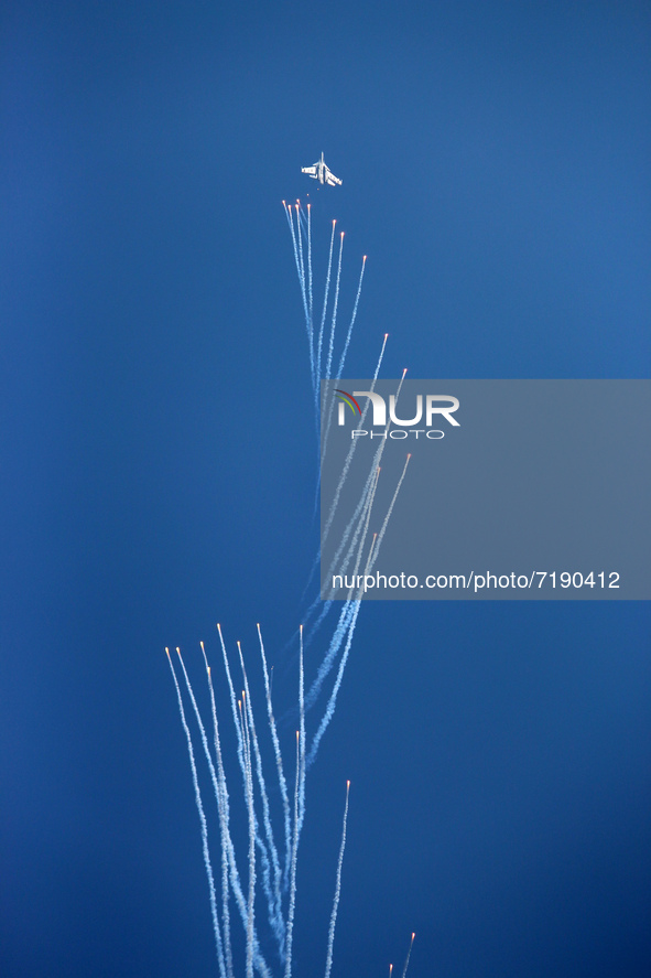 Indian Air Force's (IAF) fighter aircraft Sukhoi Su-30MKI fires flares during the 89th Air Force Day parade at Hindon Air Force Station on t...