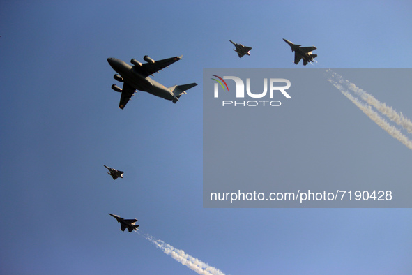 Indian Air Force's (IAF) C-17 Globemaster (C) along with two Sukhoi Su-30MKI's and two Tejas fighter aircrafts fly past during the 89th Air...