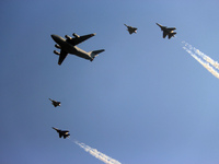 Indian Air Force's (IAF) C-17 Globemaster (C) along with two Sukhoi Su-30MKI's and two Tejas fighter aircrafts fly past during the 89th Air...