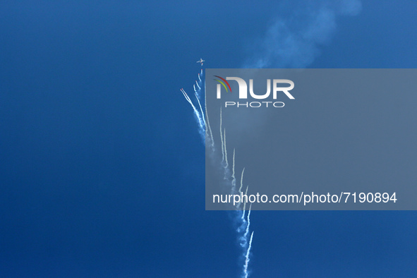 Indian Air Force's (IAF) fighter aircraft Rafale performs aerobatic maneuvers during the 89th Air Force Day parade at Hindon Air Force Stati...