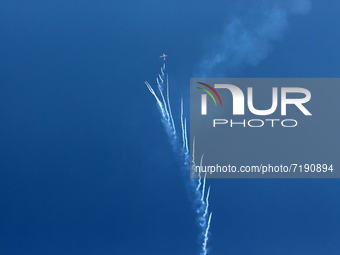 Indian Air Force's (IAF) fighter aircraft Rafale performs aerobatic maneuvers during the 89th Air Force Day parade at Hindon Air Force Stati...