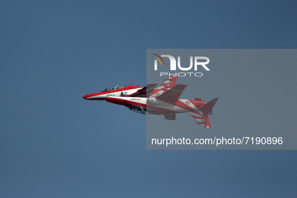 Indian Air Force's (IAF) 'Surya Kiran' aircrafts perform aerobatic maneuvers during the 89th Air Force Day parade at Hindon Air Force Statio...