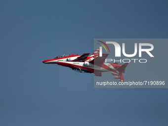 Indian Air Force's (IAF) 'Surya Kiran' aircrafts perform aerobatic maneuvers during the 89th Air Force Day parade at Hindon Air Force Statio...