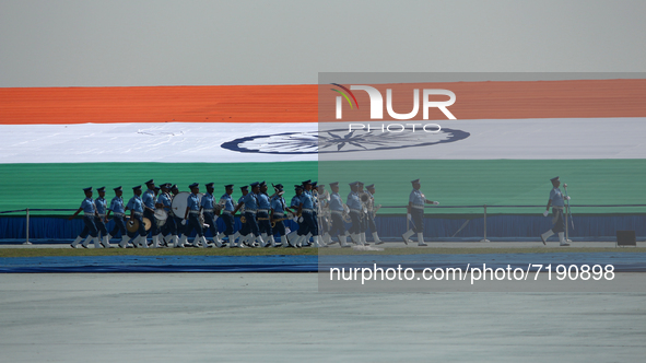 Indian Air Force (IAF) soldiers march past during the 89th Air Force Day parade at Hindon Air Force Station on the outskirts of New Delhi, I...