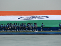 Indian Air Force (IAF) soldiers march past during the 89th Air Force Day parade at Hindon Air Force Station on the outskirts of New Delhi, I...