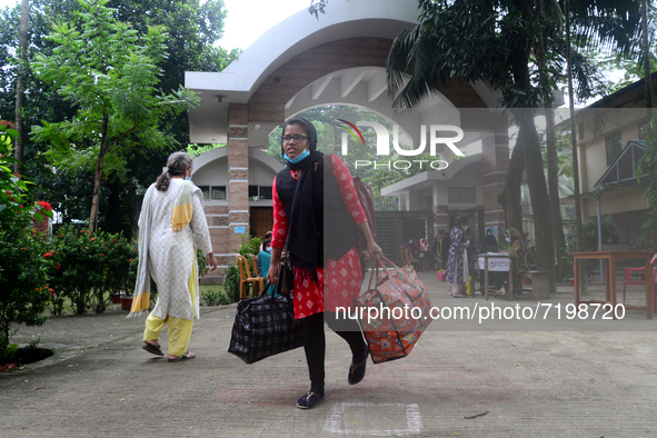 Girl students arrive at Dhaka University as reopen their residential halls after 18 months due to coronavirus emergency in Dhaka, Bangladesh...