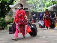 Girl students arrive at Dhaka University as reopen their residential halls after 18 months due to coronavirus emergency in Dhaka, Bangladesh...