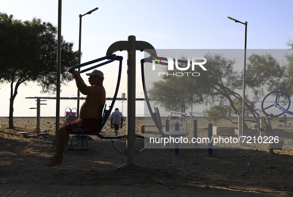 A man is exercising on a simulator on 
Power Beach in Limassol. Cyprus, Wednesday, October 13, 2021. Every second resident of Cyprus does n...