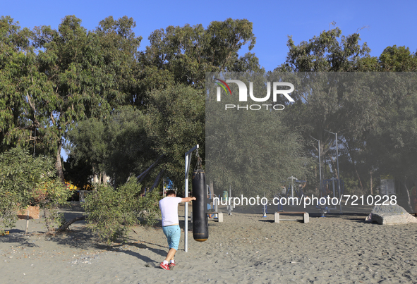 A man boxing on Power Beach in Limassol. Cyprus, Wednesday, October 13, 2021. Every second resident of Cyprus does not play sports or do any...