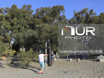 A man boxing on Power Beach in Limassol. Cyprus, Wednesday, October 13, 2021. Every second resident of Cyprus does not play sports or do any...