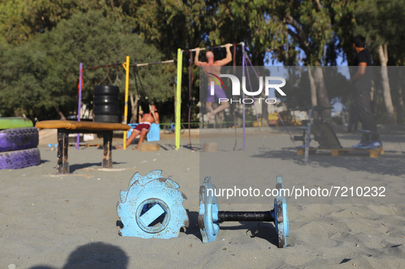 Sports dumbbells lie on Power Beach in Limassol. Cyprus, Wednesday, October 13, 2021. Every second resident of Cyprus does not play sports o...