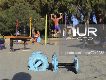 Sports dumbbells lie on Power Beach in Limassol. Cyprus, Wednesday, October 13, 2021. Every second resident of Cyprus does not play sports o...