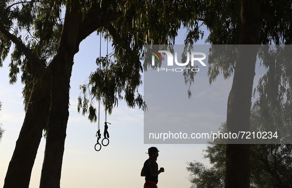 A man doing sports on Power Beach in Limassol. Cyprus, Wednesday, October 13, 2021. Every second resident of Cyprus does not play sports or...