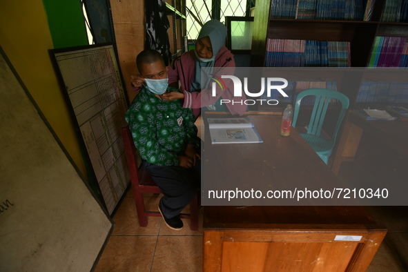 A number of students with disabilities participate in limited face-to-face learning at the Special School of SLB ABCD Muhammadiyah in Palu,...