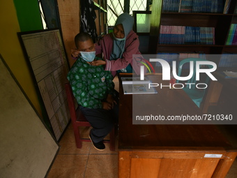 A number of students with disabilities participate in limited face-to-face learning at the Special School of SLB ABCD Muhammadiyah in Palu,...