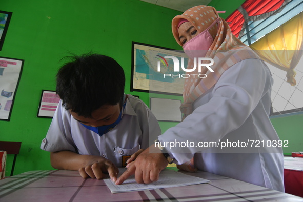 A number of students with disabilities participate in limited face-to-face learning at the Special School of SLB ABCD Muhammadiyah in Palu,...