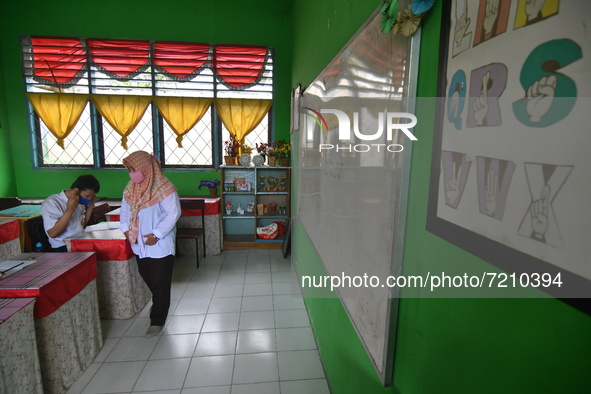 A number of students with disabilities participate in limited face-to-face learning at the Special School of SLB ABCD Muhammadiyah in Palu,...