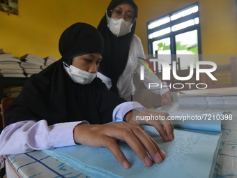 A number of students with disabilities participate in limited face-to-face learning at the Special School of SLB ABCD Muhammadiyah in Palu,...