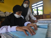 A number of students with disabilities participate in limited face-to-face learning at the Special School of SLB ABCD Muhammadiyah in Palu,...