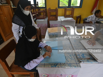 A number of students with disabilities participate in limited face-to-face learning at the Special School of SLB ABCD Muhammadiyah in Palu,...