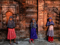 Children pose for a photo in front of Khaniadighi Masjid mosque in chapainawabganj, Bangladesh. (