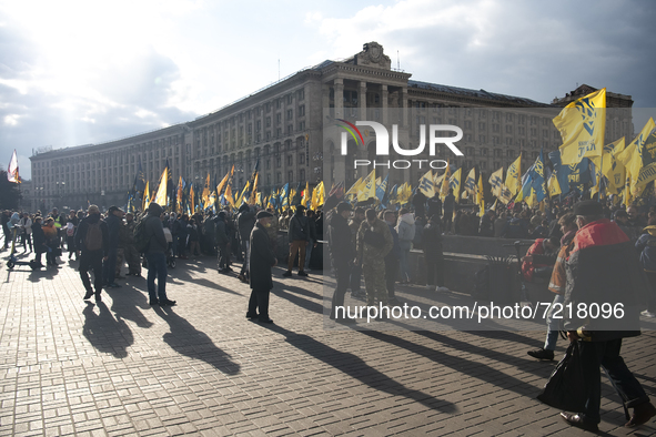 Veterans of Russian-Ukrainian war , activists and supporters of Ukraine's nationalist movements,  take part in a procession to mark the Defe...