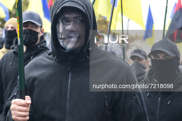 Veterans of Russian-Ukrainian war , activists and supporters of Ukraine's nationalist movements,  take part in a procession to mark the Defe...