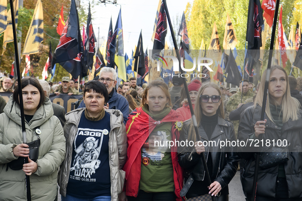 Veterans of Russian-Ukrainian war , activists and supporters of Ukraine's nationalist movements,  take part in a procession to mark the Defe...