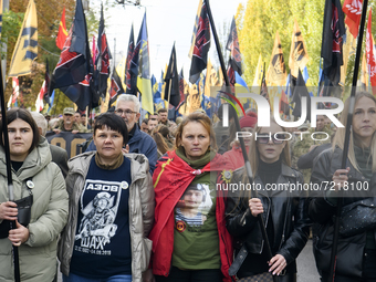 Veterans of Russian-Ukrainian war , activists and supporters of Ukraine's nationalist movements,  take part in a procession to mark the Defe...