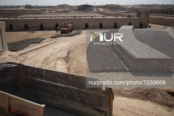 A view of a brick factory that a group of Afghan refugees work there, in the Borkhar area in the west of the city of Isfahan 439Km (273 Mile...