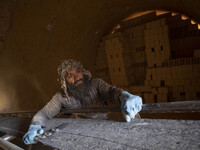 An Afghan refugee labor works in a brick factory, in the Borkhar area in the west of the city of Isfahan 439Km (273 Miles) southern Tehran o...