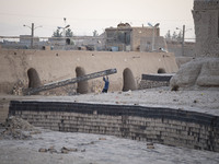 An Afghan refugee labor works in a brick factory, in the Borkhar area in the west of the city of Isfahan 439Km (273 Miles) southern Tehran o...