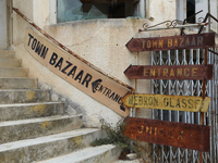 Old signs on abandoned buildings, fenced off by the Turkish military since 1974, in the abandoned coastal area of Varosha, a suburb of the c...