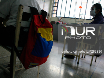 A girl looks at the blackboard during the start of face-to-face classes at all levels amidst the Coronavirus pandemic in Caracas, Venezuela...